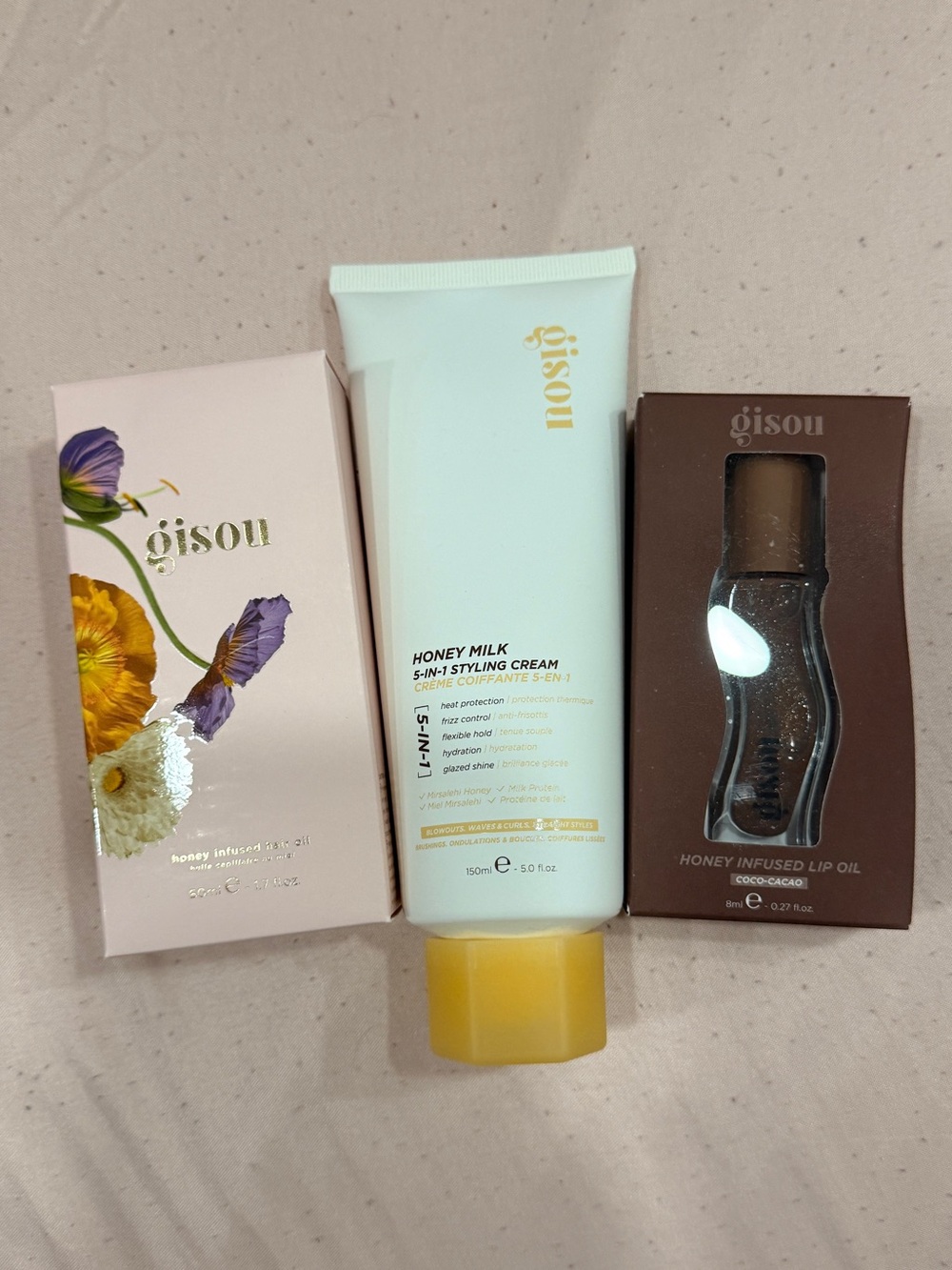 Gisou set (lip oil, 5 in 1 styling cream and honey infused hair oil)
